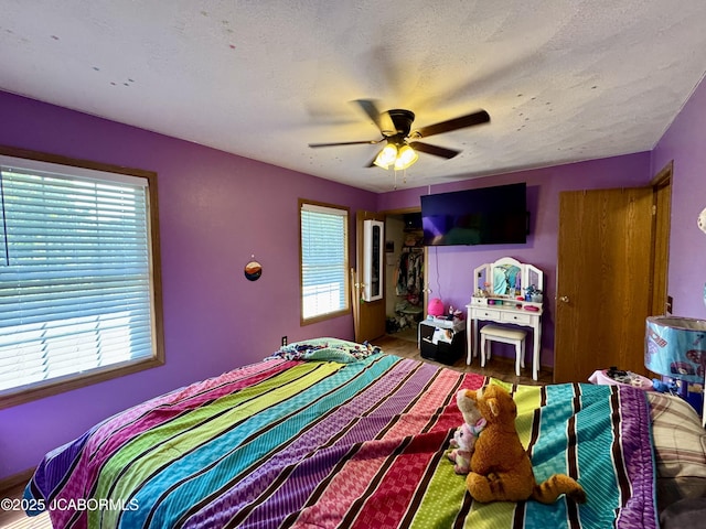 128 Don Dr, Linn, MO 65051 - bedroom featuring multiple windows and ceiling fan