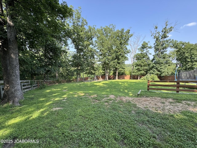 128 Don Dr, Linn, MO 65051 - fenced backyard with a playground