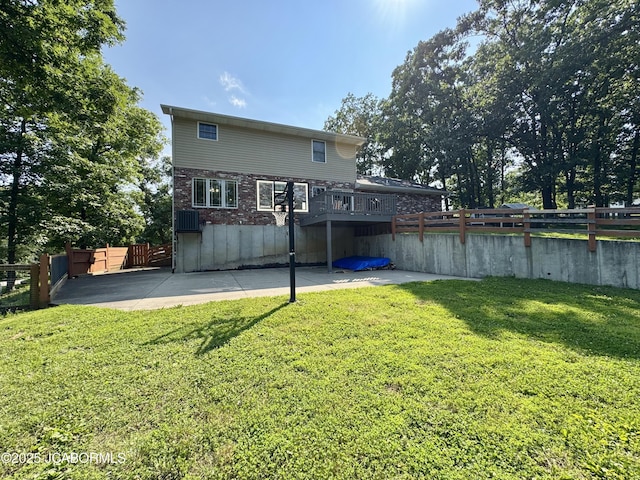 128 Don Dr, Linn, MO 65051 - rear view of property featuring a patio, a fenced backyard, and a wooden deck
