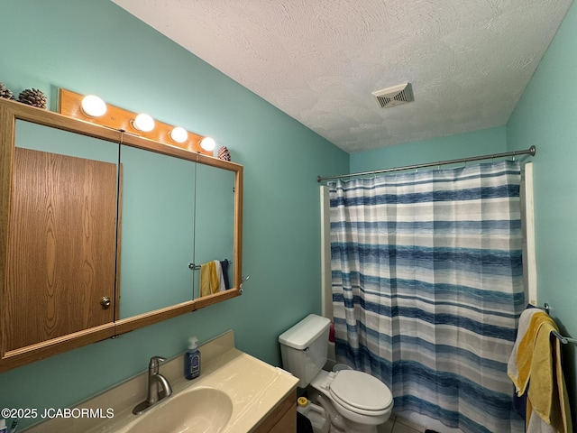 128 Don Dr, Linn, MO 65051 - full bathroom featuring a textured ceiling, vanity, and a shower with shower curtain