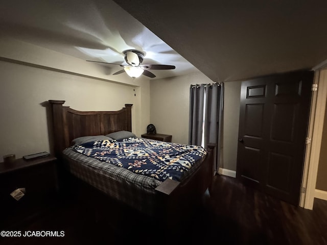 128 Don Dr, Linn, MO 65051 - bedroom featuring dark wood-style floors and a ceiling fan