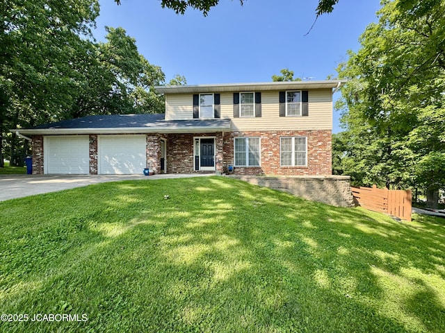 128 Don Dr, Linn, MO 65051 - traditional-style home with an attached garage, driveway, and brick siding
