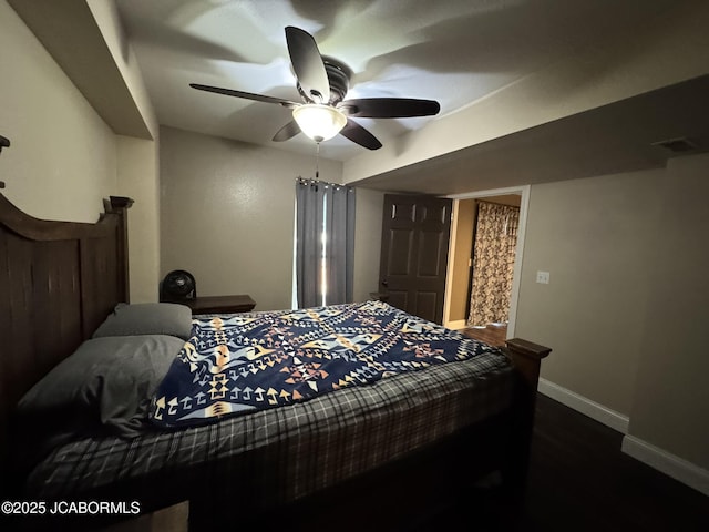 128 Don Dr, Linn, MO 65051 - bedroom featuring dark wood-style floors and ceiling fan