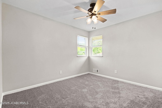 1906 Swifts Hwy, Jefferson City, MO 65109 - carpeted spare room featuring a ceiling fan and baseboards
