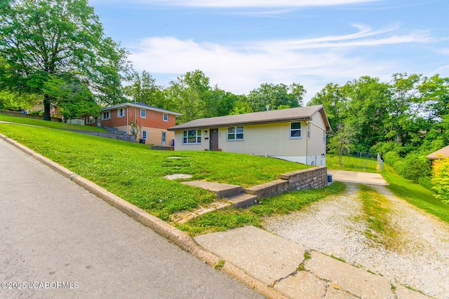 1906 Swifts Hwy, Jefferson City, MO 65109 - view of front of property featuring driveway and a front yard