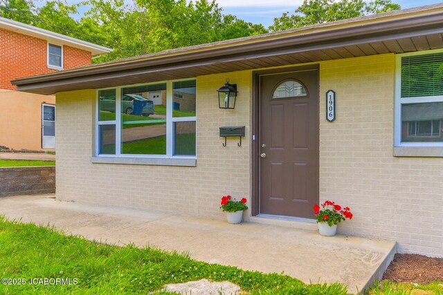 1906 Swifts Hwy, Jefferson City, MO 65109 - view of exterior entry featuring brick siding