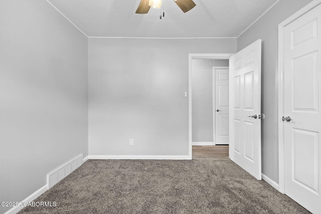 1906 Swifts Hwy, Jefferson City, MO 65109 - spare room with carpet, a ceiling fan, baseboards, and crown molding