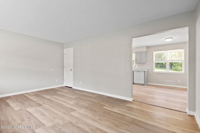 1906 Swifts Hwy, Jefferson City, MO 65109 - spare room with light wood-type flooring and baseboards
