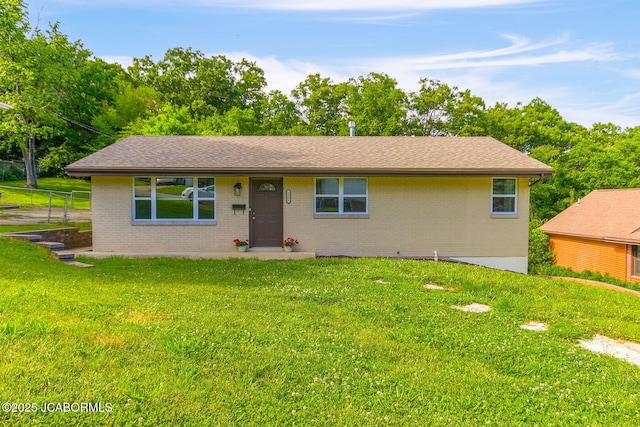 1906 Swifts Hwy, Jefferson City, MO 65109 - ranch-style home featuring brick siding and a front lawn