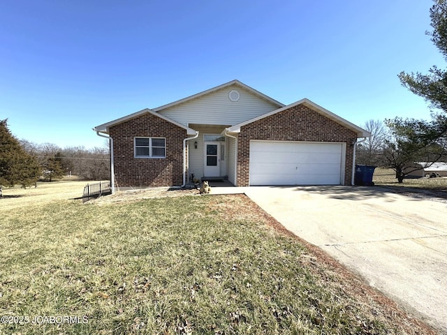 ranch-style home featuring a front lawn, a garage, brick siding, and driveway