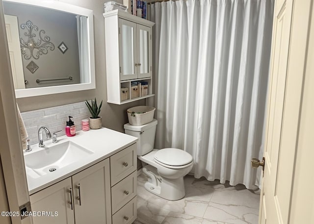 full bath with a shower with shower curtain, vanity, toilet, decorative backsplash, and marble finish floor