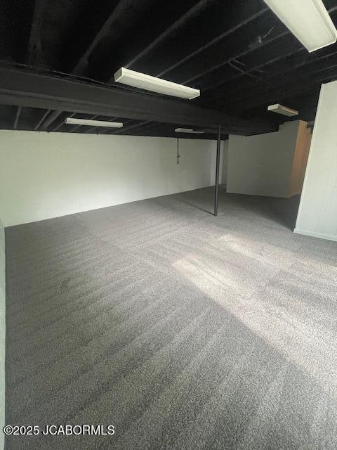 finished basement with carpet flooring