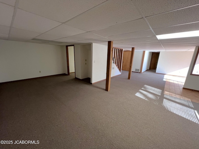 2362 County Road 4032, Holts Summit, MO 65043 - basement featuring carpet flooring and a paneled ceiling