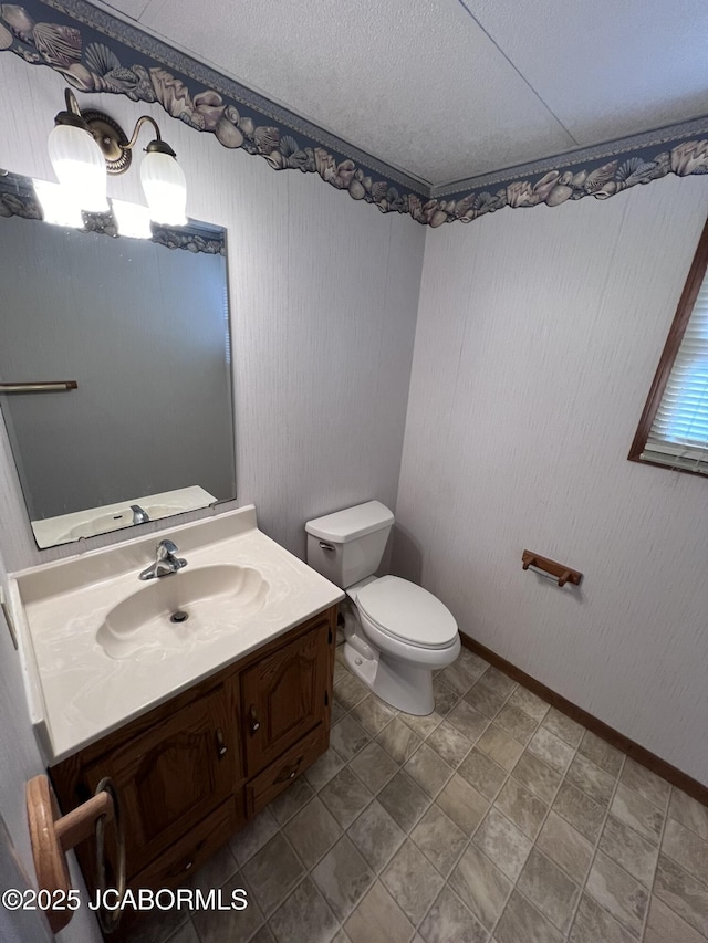 2362 County Road 4032, Holts Summit, MO 65043 - bathroom featuring vanity, a textured ceiling, and toilet