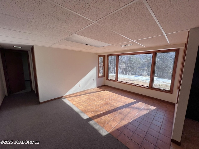 2362 County Road 4032, Holts Summit, MO 65043 - tiled spare room with a drop ceiling