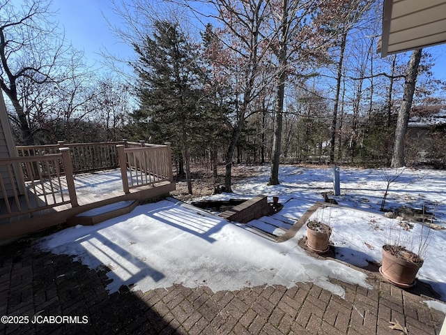 2362 County Road 4032, Holts Summit, MO 65043 - snowy yard with a deck