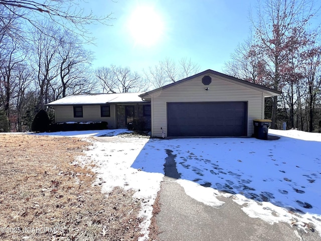 2362 County Road 4032, Holts Summit, MO 65043 - ranch-style home with a garage