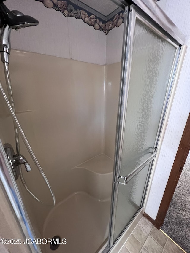 2362 County Road 4032, Holts Summit, MO 65043 - bathroom featuring an enclosed shower and tile patterned floors