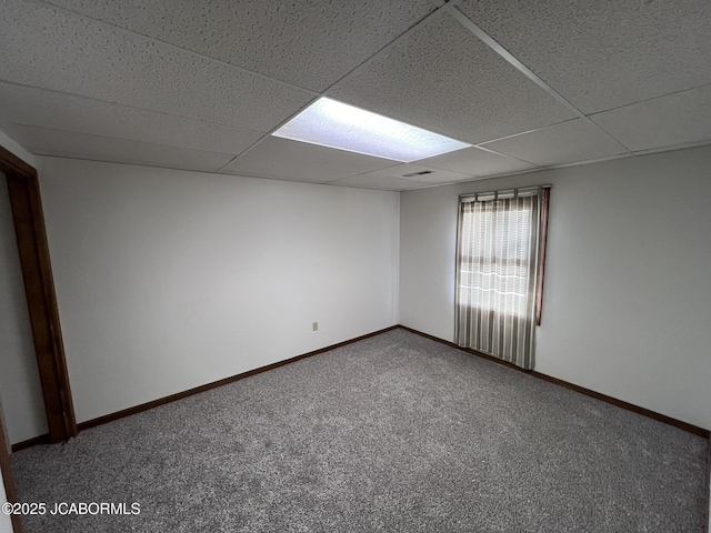 2362 County Road 4032, Holts Summit, MO 65043 - spare room with a drop ceiling and carpet