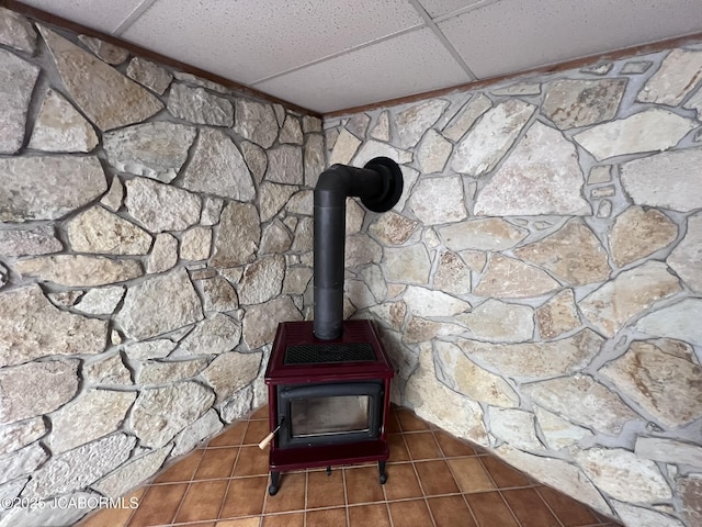 2362 County Road 4032, Holts Summit, MO 65043 - details featuring a paneled ceiling and a wood stove