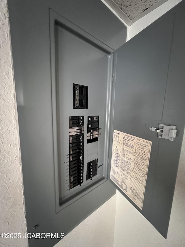 2362 County Road 4032, Holts Summit, MO 65043 - utility room featuring electric panel
