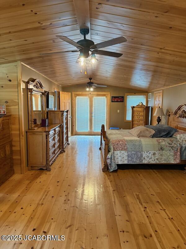 11 Copperhead Rd, Eldon, MO 65026 - bedroom featuring lofted ceiling, light wood-type flooring, and wooden ceiling