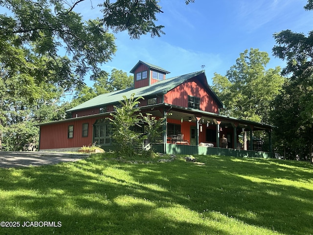 11 Copperhead Rd, Eldon, MO 65026 - view of front facade with a front yard and covered porch