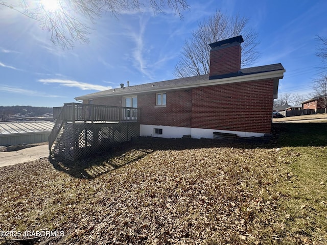 rear view of house with a deck