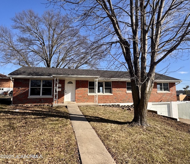 ranch-style home with a front lawn