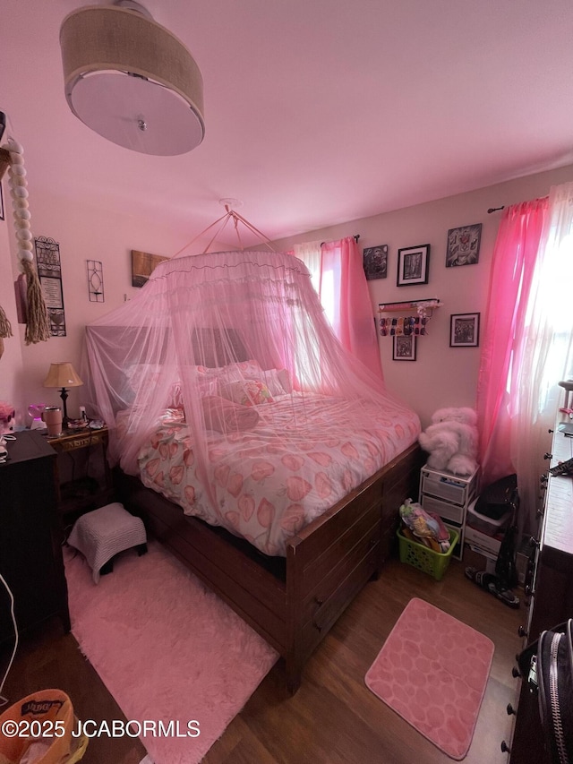 106 S Main St, Chamois, MO 65024 - bedroom featuring wood finished floors