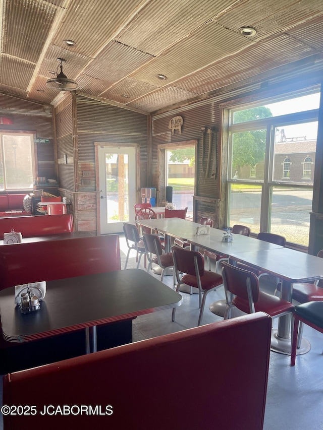 106 S Main St, Chamois, MO 65024 - dining area featuring finished concrete floors and lofted ceiling