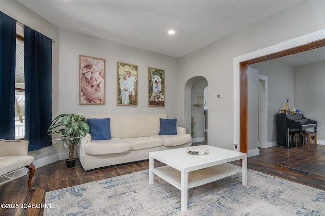 living room with dark wood-type flooring