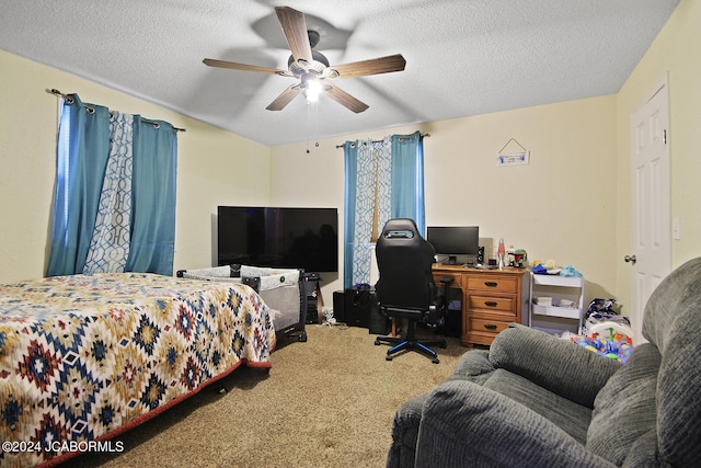 bedroom with carpet flooring, ceiling fan, and a textured ceiling