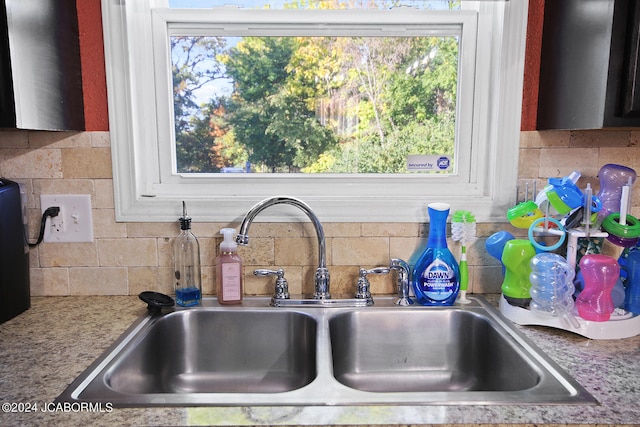 details with tasteful backsplash and sink