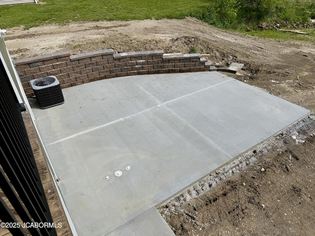 5519 Kenview Dr, Jefferson City, MO 65109 - view of patio / terrace featuring central AC