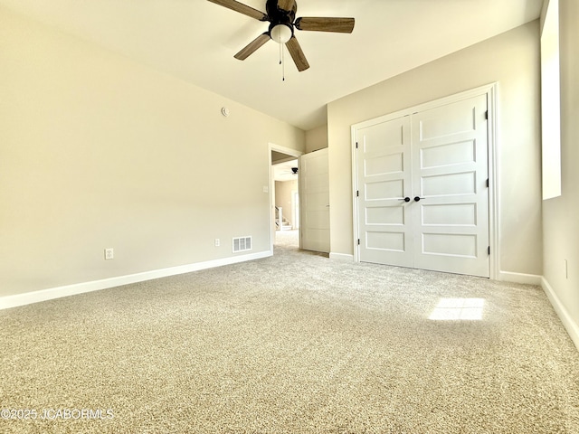 5519 Kenview Dr, Jefferson City, MO 65109 - unfurnished bedroom featuring baseboards, ceiling fan, carpet flooring, and visible vents