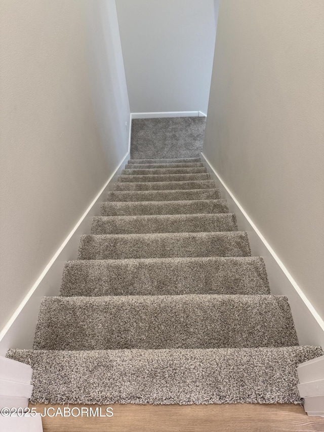 5519 Kenview Dr, Jefferson City, MO 65109 - stairs featuring baseboards