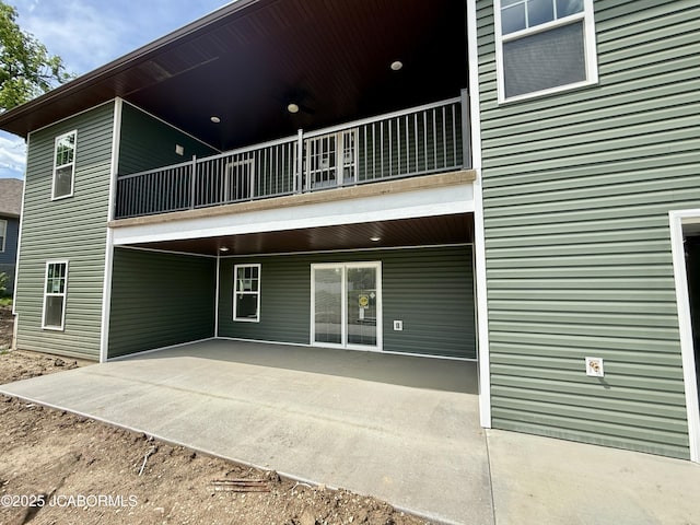 5519 Kenview Dr, Jefferson City, MO 65109 - rear view of house featuring a patio and a balcony
