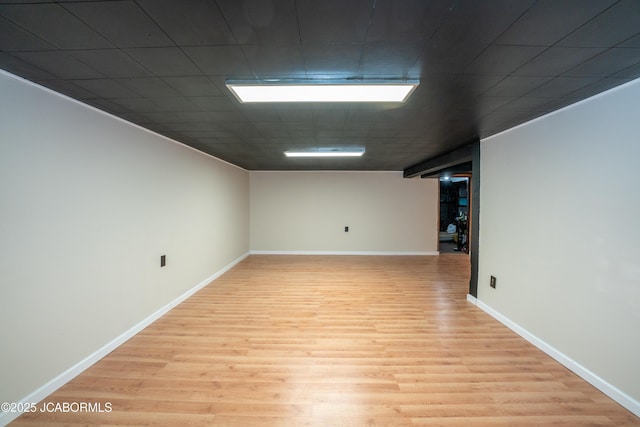 empty room with light hardwood / wood-style floors