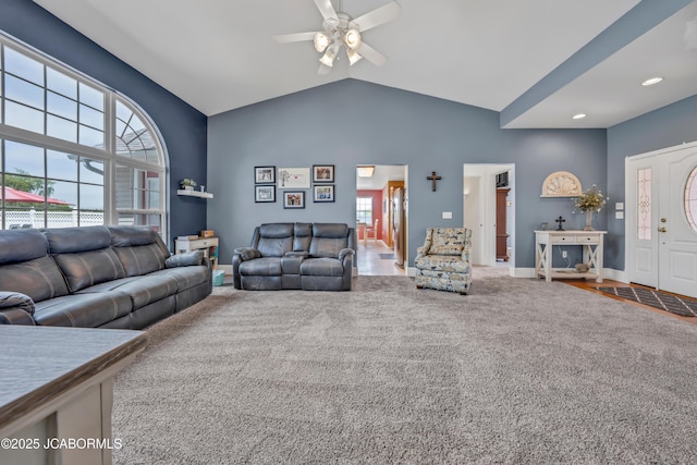 living area featuring a ceiling fan, baseboards, high vaulted ceiling, carpet flooring, and recessed lighting