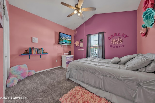 carpeted bedroom with baseboards, ceiling fan, and vaulted ceiling