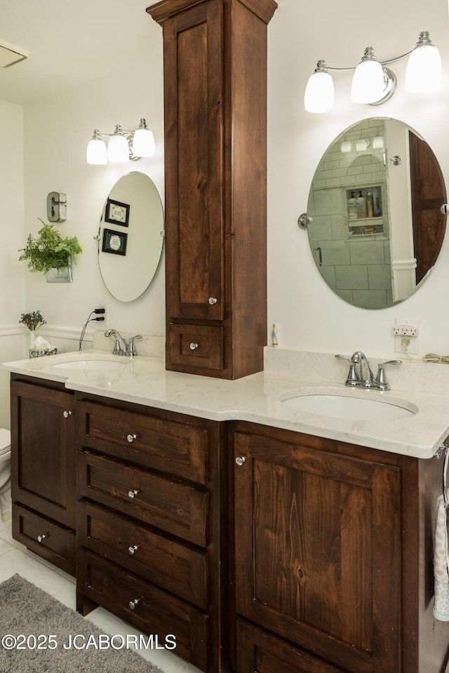 bathroom featuring vanity and tile patterned flooring