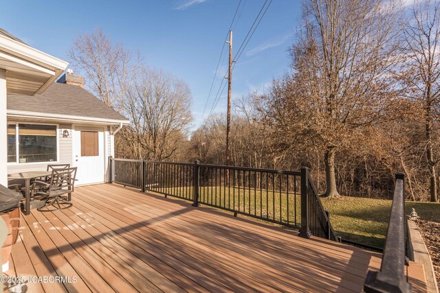 view of snow covered deck