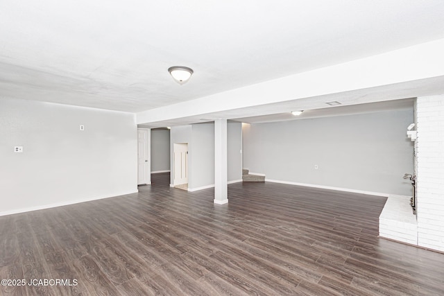 362 Vanhorn Rd, Holts Summit, MO 65043 - finished below grade area featuring dark wood-style flooring and baseboards