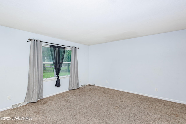 362 Vanhorn Rd, Holts Summit, MO 65043 - spare room featuring carpet floors and baseboards