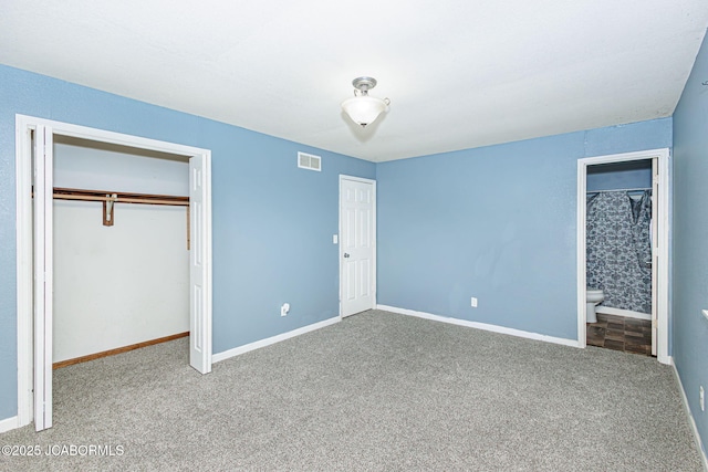 362 Vanhorn Rd, Holts Summit, MO 65043 - unfurnished bedroom featuring carpet flooring, a closet, and connected bathroom
