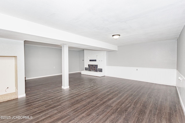 362 Vanhorn Rd, Holts Summit, MO 65043 - finished below grade area featuring dark wood-style floors and a brick fireplace
