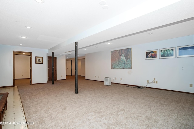 basement with light colored carpet