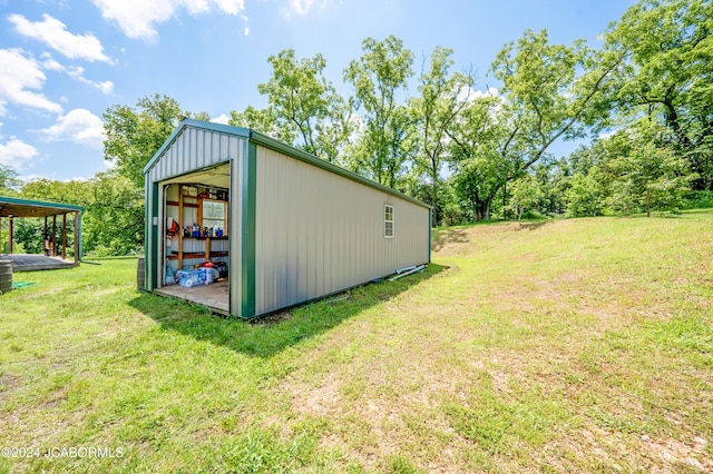 view of outdoor structure with a yard