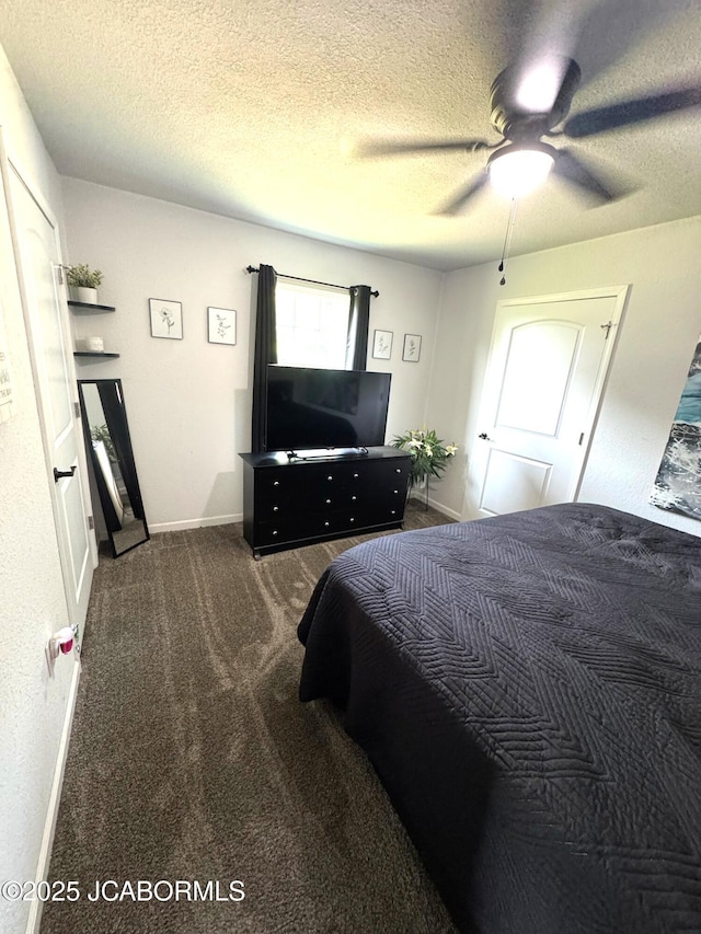 57421 Lake Imhoff Rd, California, MO 65018 - carpeted bedroom featuring baseboards, a textured ceiling, and ceiling fan